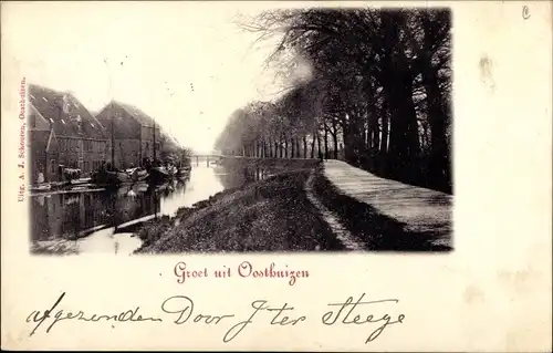 Ak Oosthuizen Nordholland Niederlande, Flusspartie, Weg, Ortsansichten