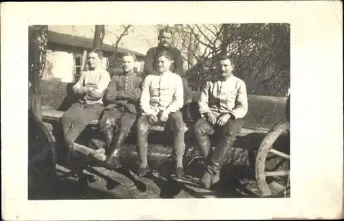 Foto Ak Hamburg Nord Uhlenhorst, Portrait, vier Männer auf Fuhrwerk sitzend