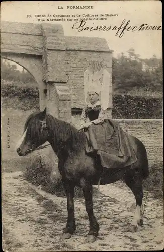 Ak Calvados, Normandie, Femme en Costume traditionnel, Normande sur sa Bidette d´Allure