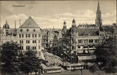 Ak Düsseldorf am Rhein, Partie im Ort aus der Vogelperspektive, Straßenbahnen