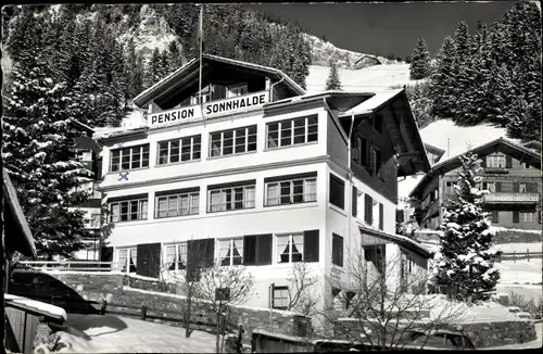 Ak Adelboden Kanton Bern Schweiz, Pension Sonnhalde, Außenansicht, Winter