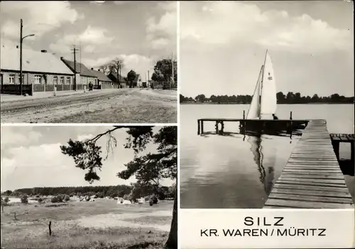Ak Silz, Partie am Wasser mit Steg und Segelboot, Landschaftsansicht, Straßenansicht