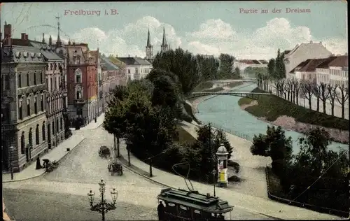 Ak Freiburg im Breisgau, Partie an der Dreisam, Straßenbahn