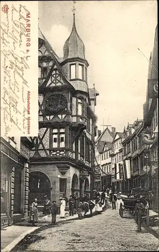 Ak Marburg an der Lahn, Altdeutsches Holzhaus, Straßenszene