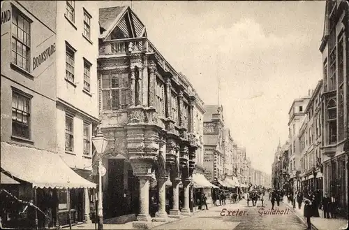 Ak Exeter Devon England, Guildhall, Bookstore, Straßenszene mit Menschen und Kutschen