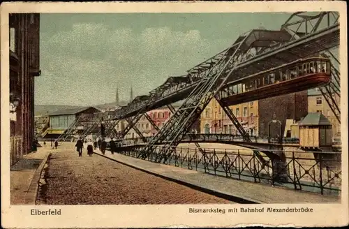 Ak Elberfeld Wuppertal in Nordrhein Westfalen, Bismarcksteg, Bahnhof Alexanderbrücke, Schwebebahn
