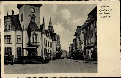 Ak Güstrow in Mecklenburg, Pferdemarkt mit Borwinbrunnen