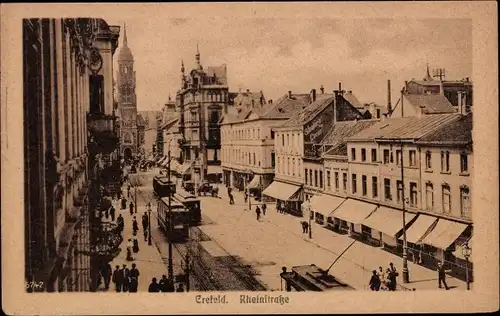 Ak Krefeld am Niederrhein, Straßenbahnen in der Rheinstraße, Geschäfte