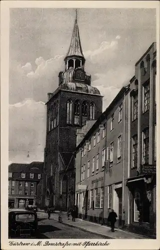 Ak Güstrow in Mecklenburg, Domstraße mit Pfarrkirche