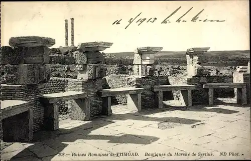 Ak Timgad Algerien, Ruines Romaines, Boutiques du Marche de Sertius, Römische Ruinen