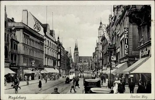 Ak Magdeburg an der Elbe, Breiter Weg, Straßenbahn 31, Passanten, Kirche