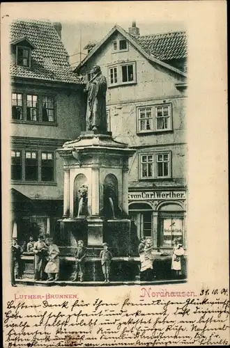 Ak Nordhausen am Harz, Luther-Denkmal, Geschäft vom Carl Werther