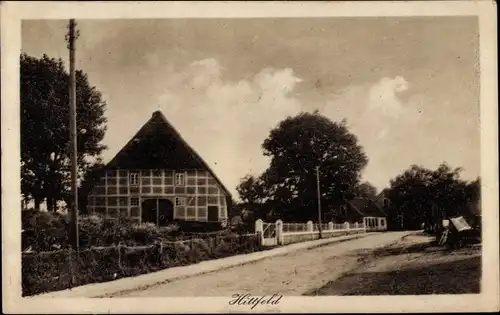 Ak Hittfeld Seevetal in Niedersachsen, Straßenpartie im Ort mit Bauernhaus