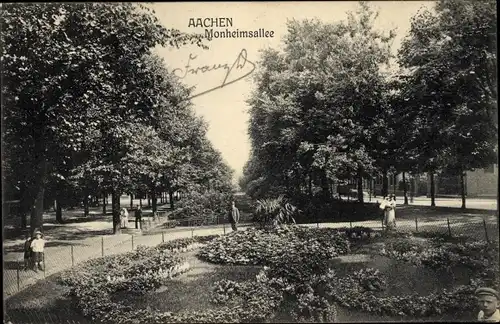 Ak Aachen in Nordrhein Westfalen, Monheimsallee, Passanten, Blumenbeete