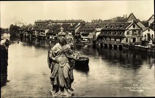 Ak Bamberg an der Regnitz Oberfranken, Regnitzpartie mit Statue der hl. Kunigunde