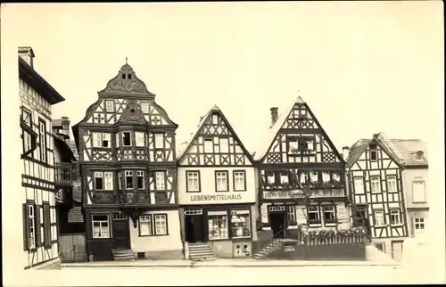 Foto Ak Idstein im Taunus Hessen, Alte Häuser am Graf Adolf Platz, Lebensmittelhaus