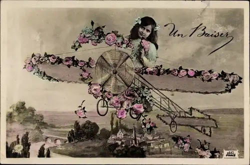 Ak Mädchen in einem Flugzeug, Rosen, Fotomontage