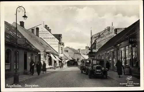 Ak Ängelholm Schweden, Storgatan, Straßenpartie, Autos, Friseu