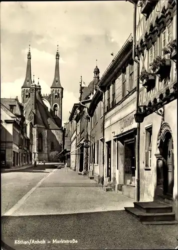 Ak Köthen in Anhalt, Blick in die Marktstraße, Geschäft Günther, Blick zur Kirche