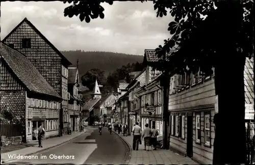 Ak Wildemann Clausthal Zellerfeld im Oberharz, Straßenpartie, Geschäfte, Passanten