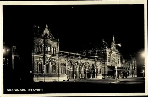 Ak Groningen Niederlande, Station, Bahnhof bei Nacht