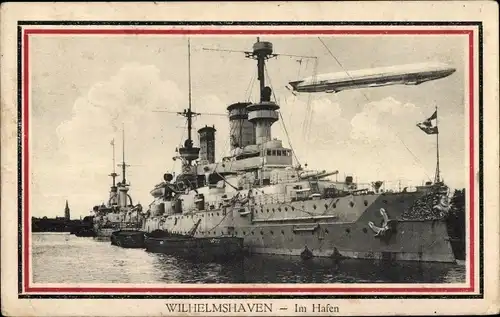 Ak Deutsches Kriegsschiff in Wilhelmshaven, Hafenansicht, Zeppelin, Kaiserliche Marine