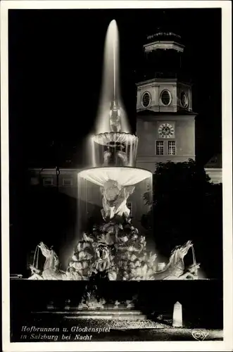 Ak Salzburg in Österreich, Hofbrunnen u. Glockenspiel bei Nacht