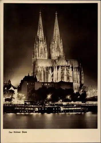 Ak Köln am Rhein, Kölner Dom, Rheinschiff, Nachtansicht
