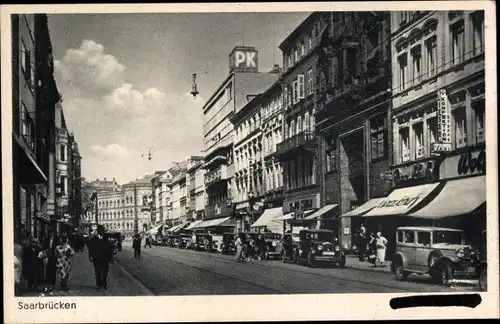 Ak Saarbrücken im Saarland, Straßenpartie, Autos, Lieser Konfektion, PK