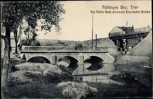 Ak Püttlingen im Saarland, Partie am Köller Bach mit neuer Eisenbahnbrücke