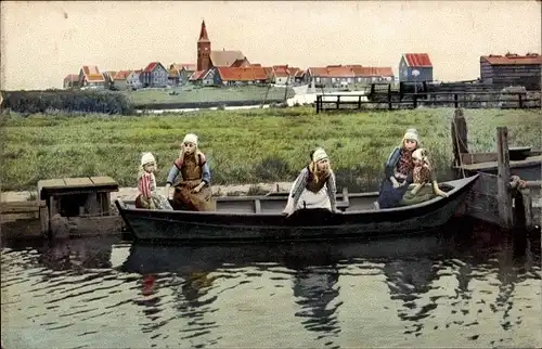 Ak Niederländische Tracht, Kinder im Ruderboot