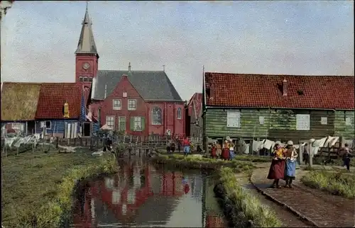 Ak Niederländische Tracht, Ortsansicht, Wäsche, Kirche