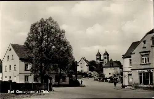 Ak Bad Klosterlausnitz in Thüringen, Straßenpartie in Ortschaft, Textilien Konsum, HO