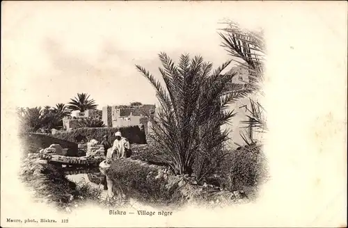 Ak Biskra Algerien, Village negre, Häuser, Palmen