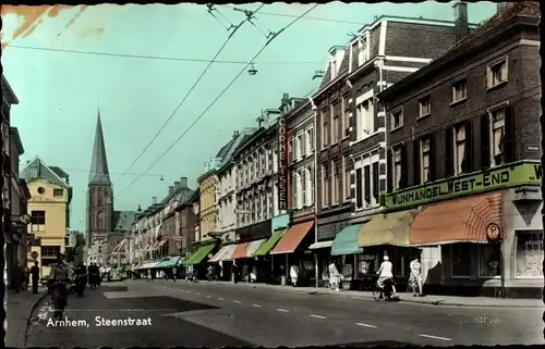 Ak Arnhem Gelderland Niederlande, Steenstraat, Straßenansicht, Kirche, Wijnhandel West End