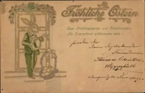 Präge Ak Glückwunsch Ostern, Vermenschlichter Hase mit Eierkorb vor einer Tür
