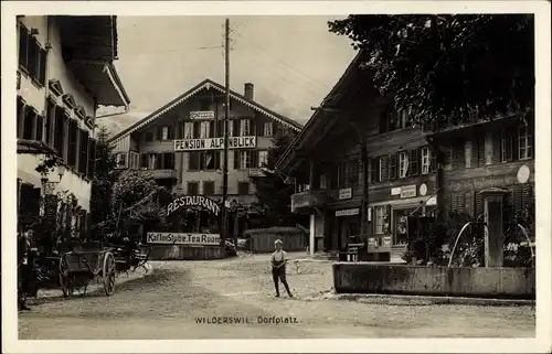 Ak Wilderswil Kt. Bern Schweiz, Dorfplatz, Pension Alpenblick, Restaurant, Brunnen