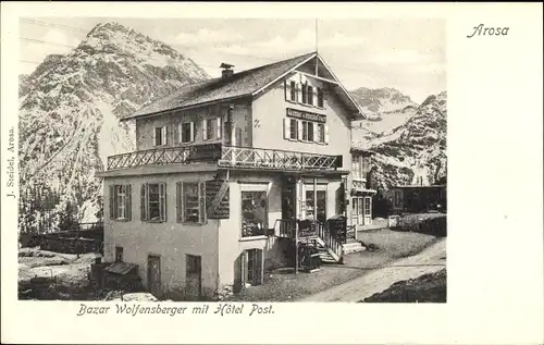 Ak Arosa Kanton Graubünden Schweiz, Bazar Wolfensberger mit Hotel Post