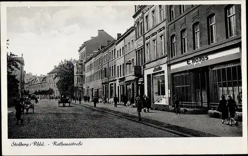Ak Stolberg im Rheinland, Blick in die Rathausstraße, Geschäfte E. Monas, Schüller, Passanten