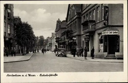 Ak Nordenham im Oldenburger Land, Bahnhofstraße mit Cafe Central, Geschäfte, Passanten