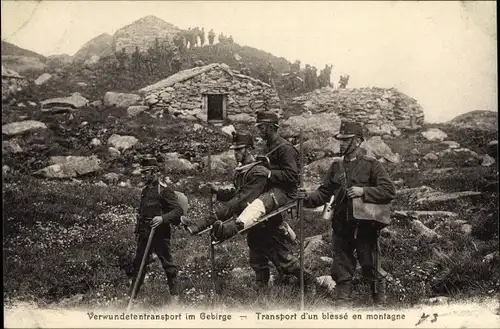 Ak Schweizer Soldaten, Verwundetentransport im Gebirge