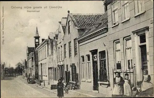 Ak IJzendijke Sluis Zeeland Niederlande, Beursstraat, Straßenpartie in der Stadt