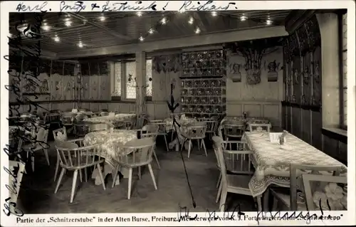 Ak Freiburg im Breisgau, Partie der Schnitzerstube in der Alte Burse, Weinrestaurant, Bursen Passage