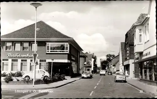 Ak Löningen Oldenburger Münsterland, Tabbenstraße, Raiffeisenbank, Autos