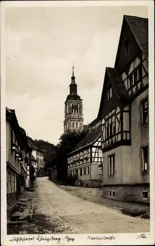 Ak Königsberg in Mainfranken, Marienstraße mit Blick zur Kirche, Wohnhäuser