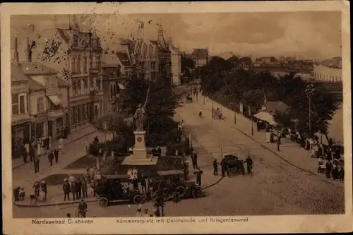 Ak Nordseebad Cuxhaven, Kämmererplatz mit Deichstraße und Kriegerdenkmal