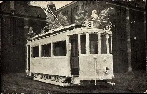 Ak Den Haag Südholland, geschmückter Straßenbahnwagen, De Winter