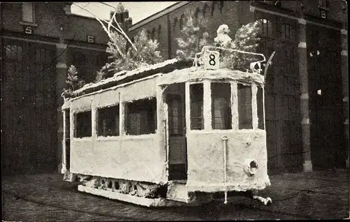 Ak Den Haag Südholland, geschmückter Straßenbahnwagen, De Winter