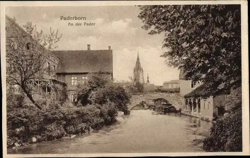 Ak Paderborn in Westfalen, An der Pader, Brücke, Kirchturm