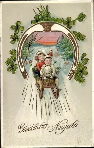 Ak Glückwunsch Neujahr, Kinder fahren Schlitten, Hufeisen, Glücksklee
